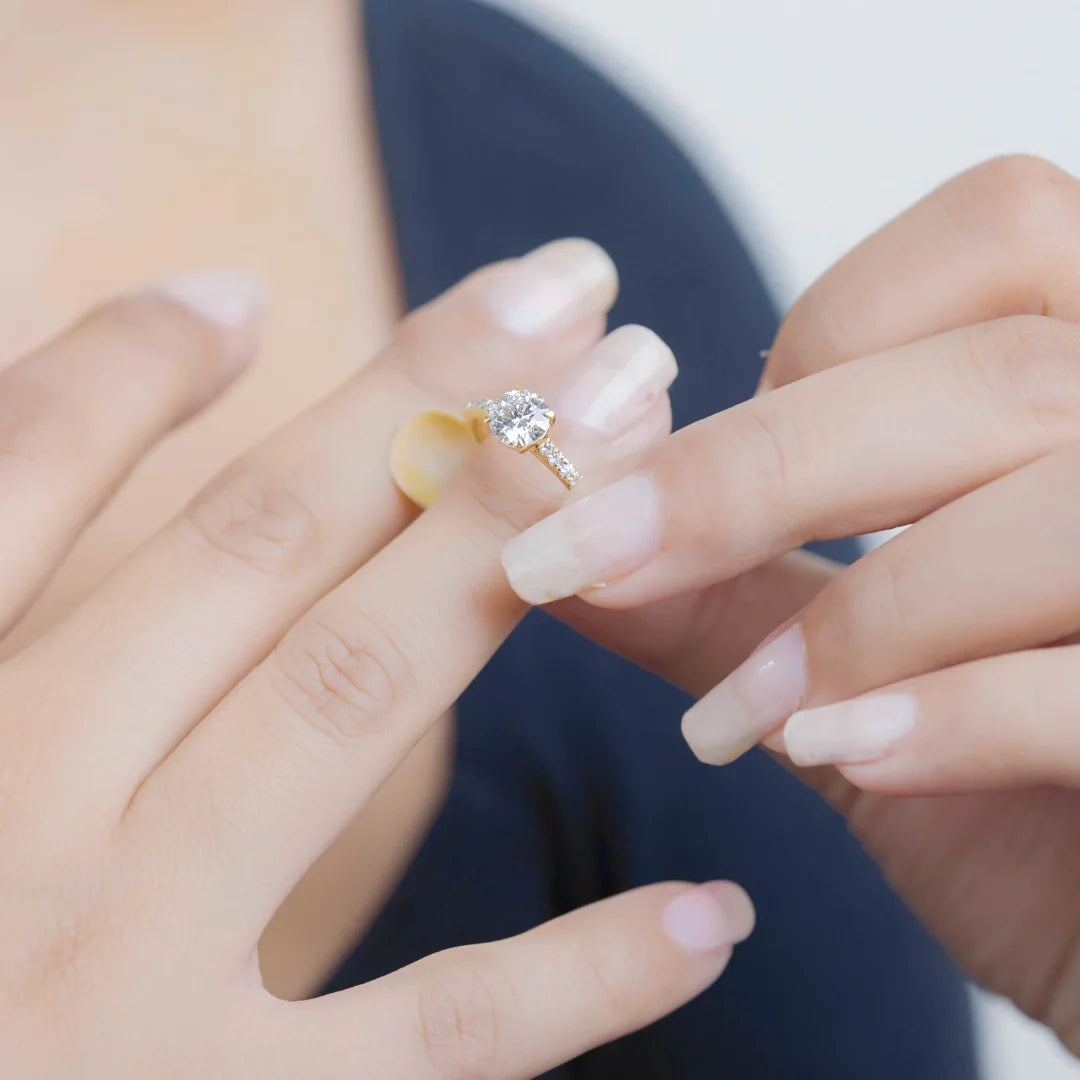 Sparkling Solitaire Diamond Ring wearing on finger by model