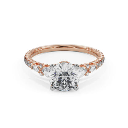 Pear Cut Sidestone Diamond Ring Front View in 9KT